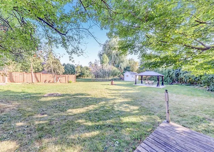 Stunning 7 Bedroom Rougeview Home With 2 Kitchens, 5 Bathrooms, Amazing Backyard & 8-Car Parking