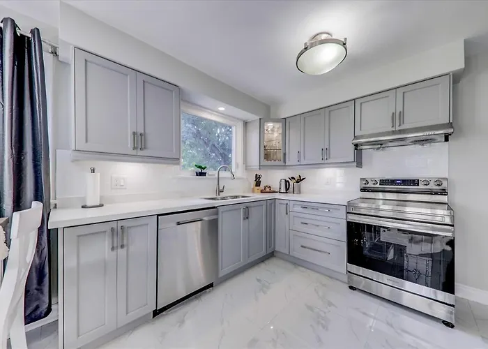 Stunning 7 Bedroom Rougeview Home With 2 Kitchens, 5 Bathrooms, Amazing Backyard & 8-Car Parking